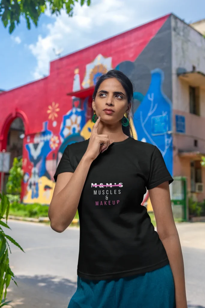 A-woman-with-a-thoughtful-look-in-the-street-wearing-a-t-shirt.