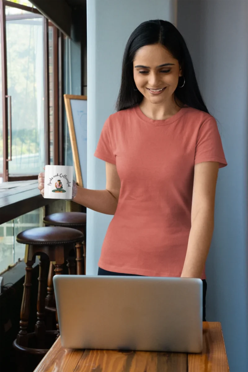 gildan-t-shirt-mockup-of-a-woman-holding-an-coffee-mug.