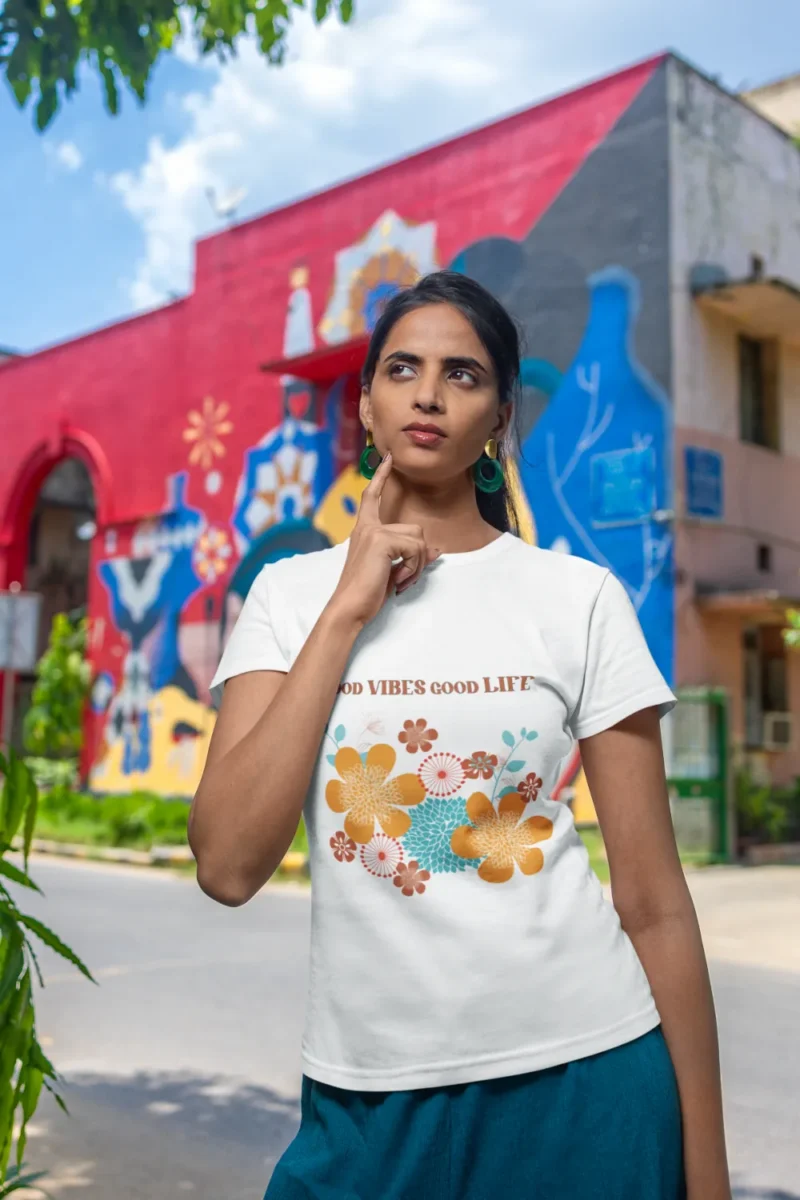 T-shirt-featuring-a-woman-with-a-thoughtful-look-in-the-street.