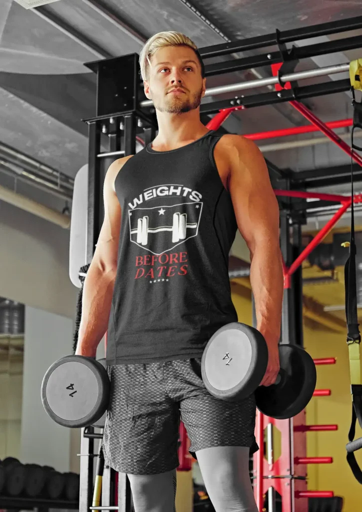 A-bearded-blonde-man-at-the-gym-wearing-gym-vest