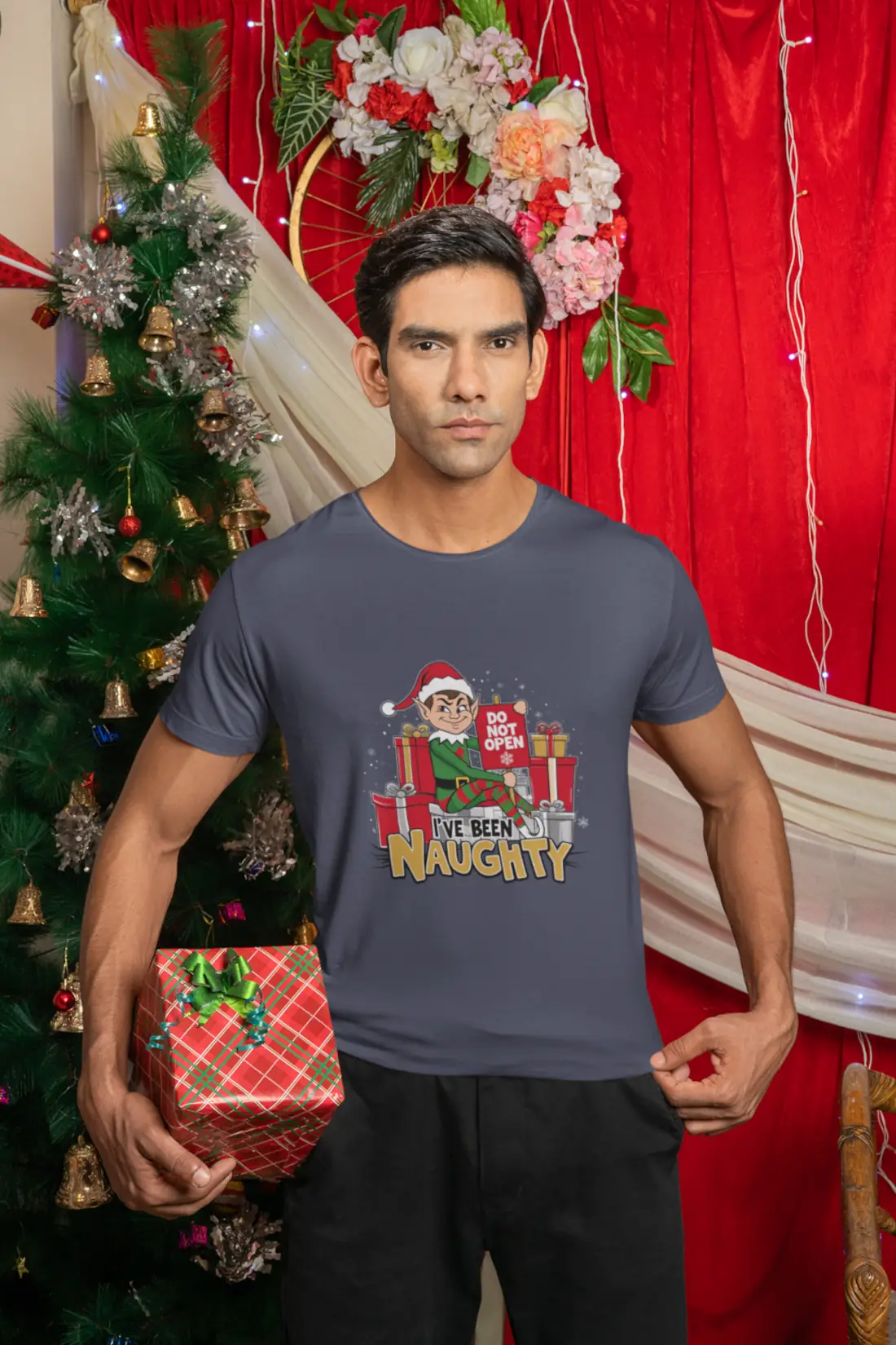 gildan-t-shirt-mockup-featuring-a-serious-man-celebrating-christmas